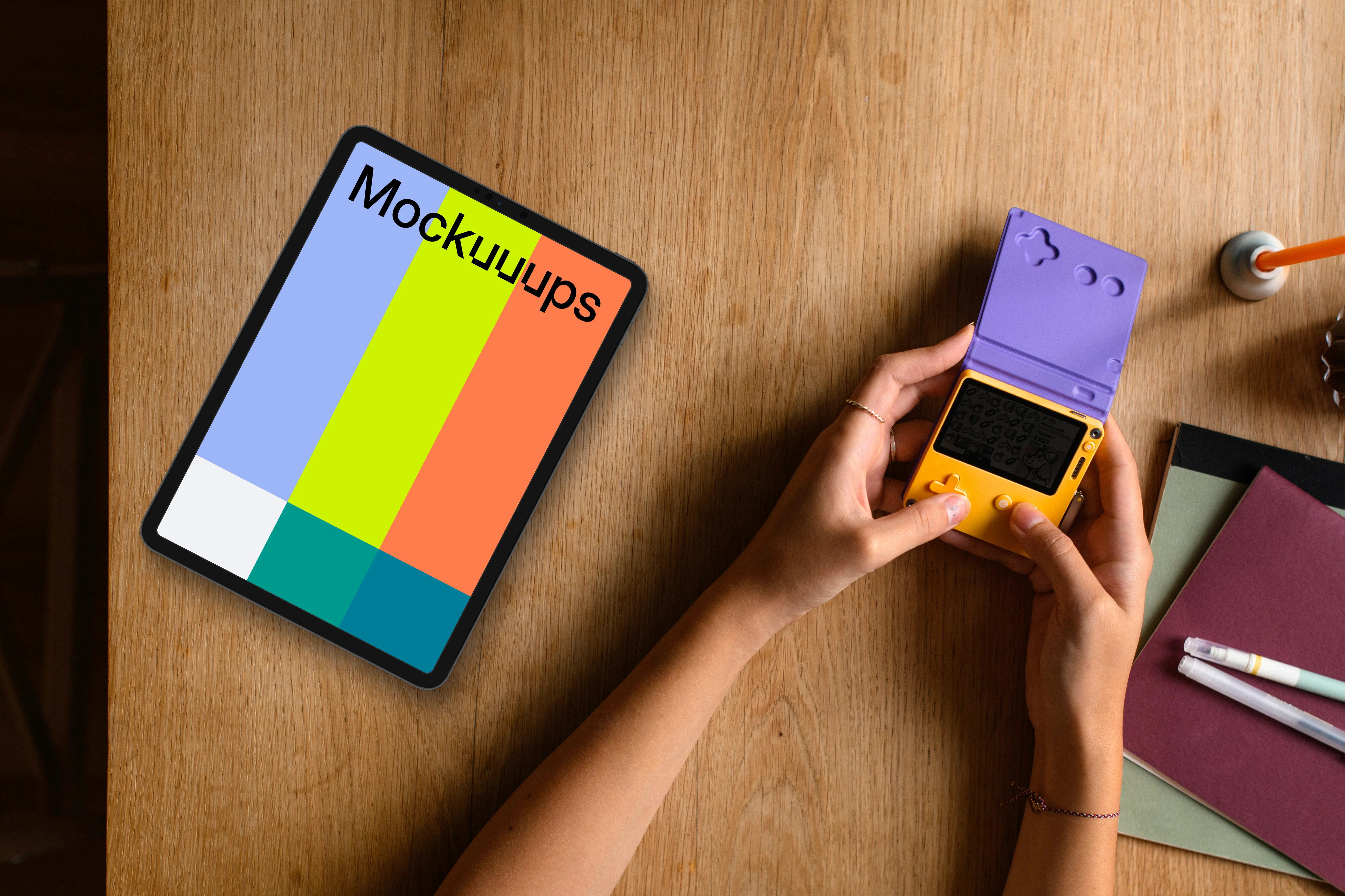 Tablet mockup on a wooden desk with gaming device
