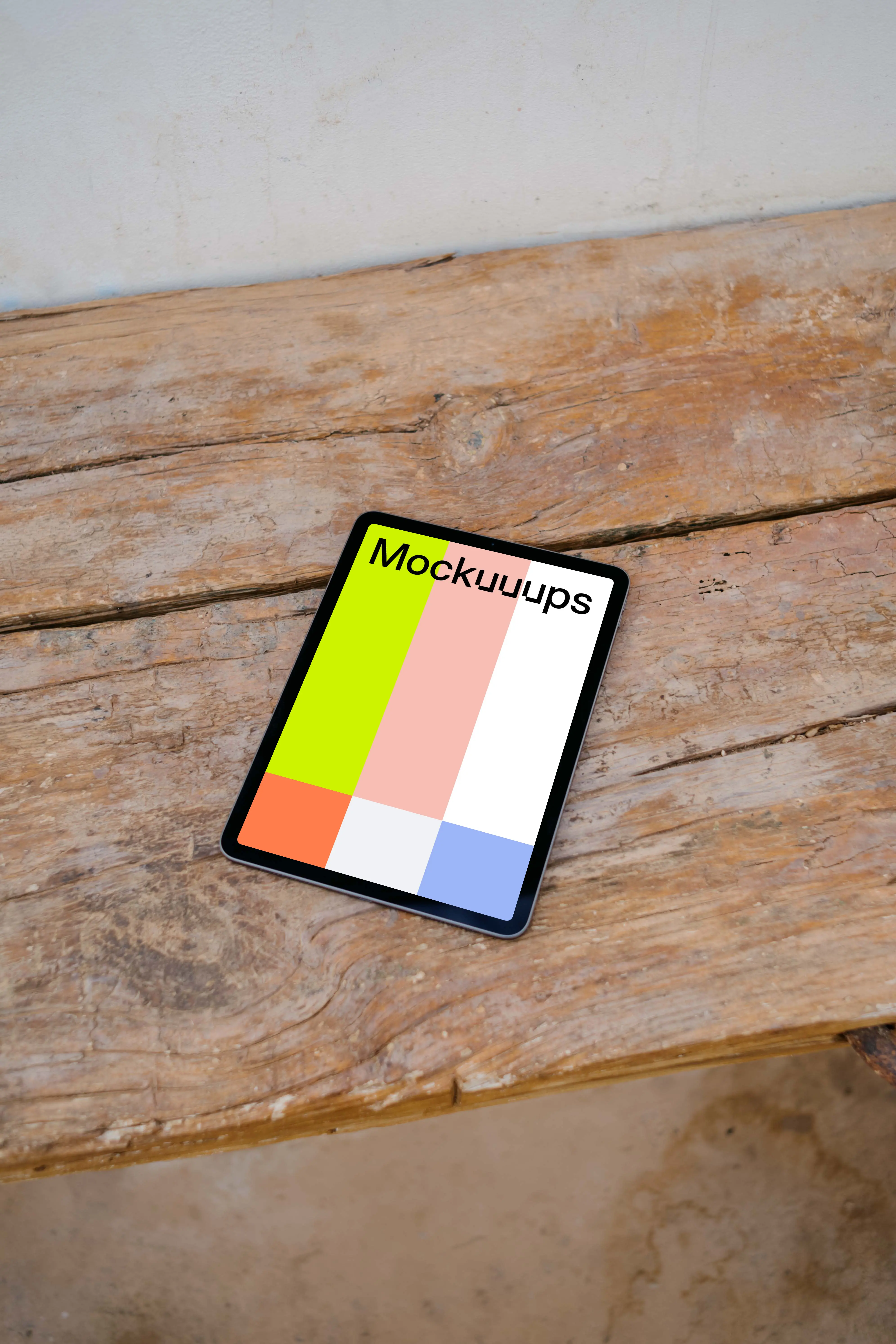 Tablet mockup on wooden table