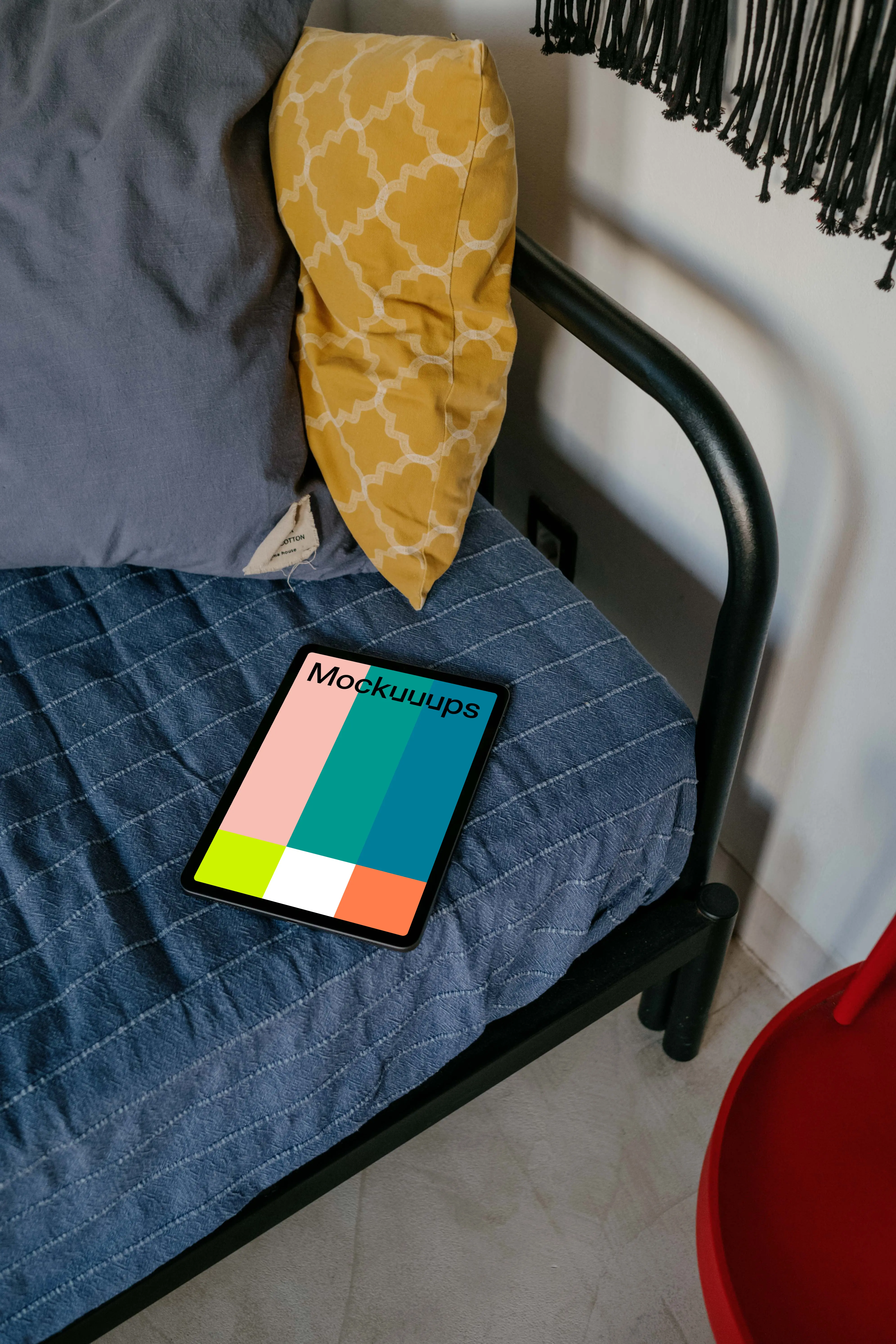 Tablet mockup placed on a bed