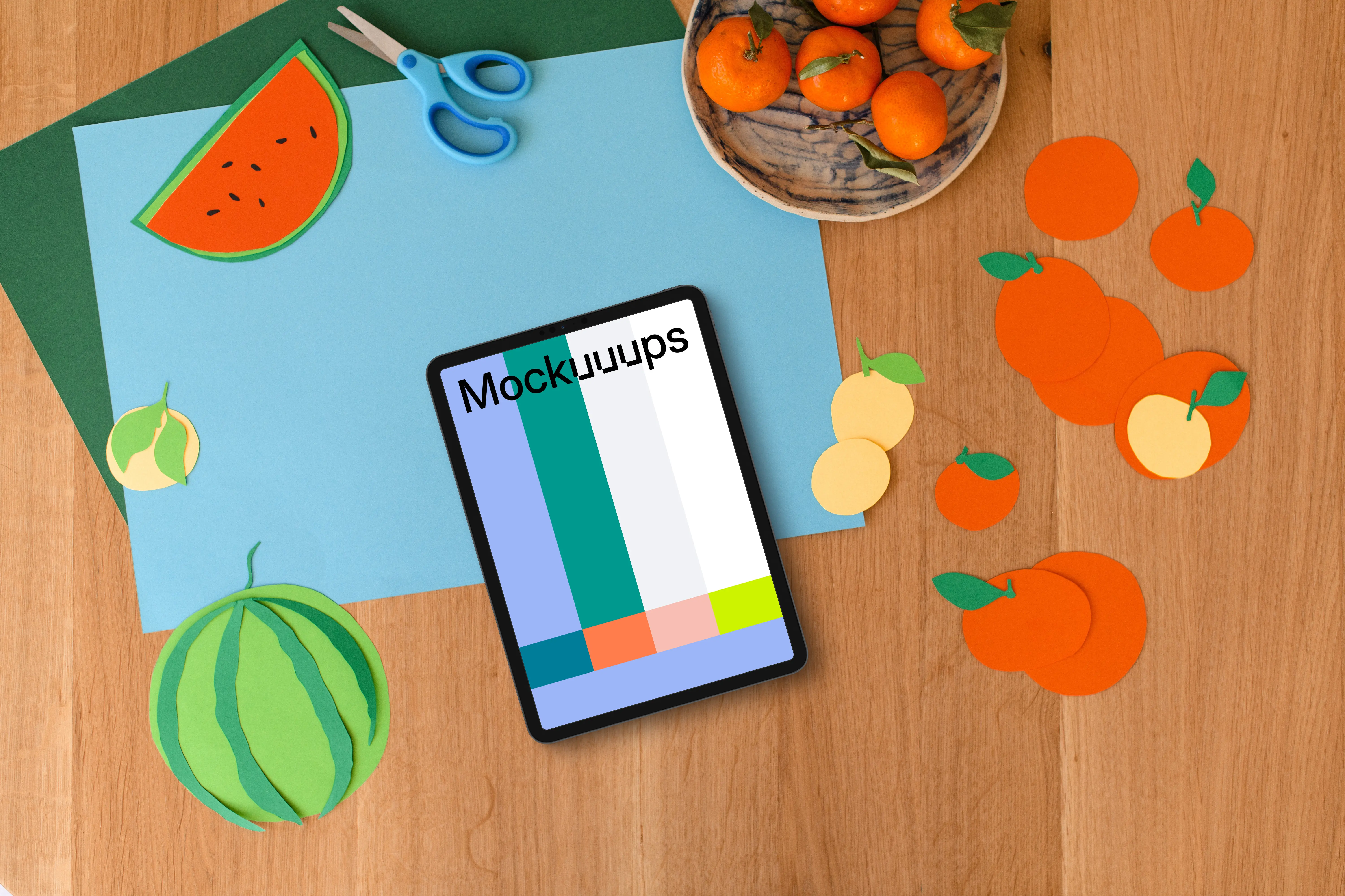 Tablet mockup with colorful fruit paper cutouts