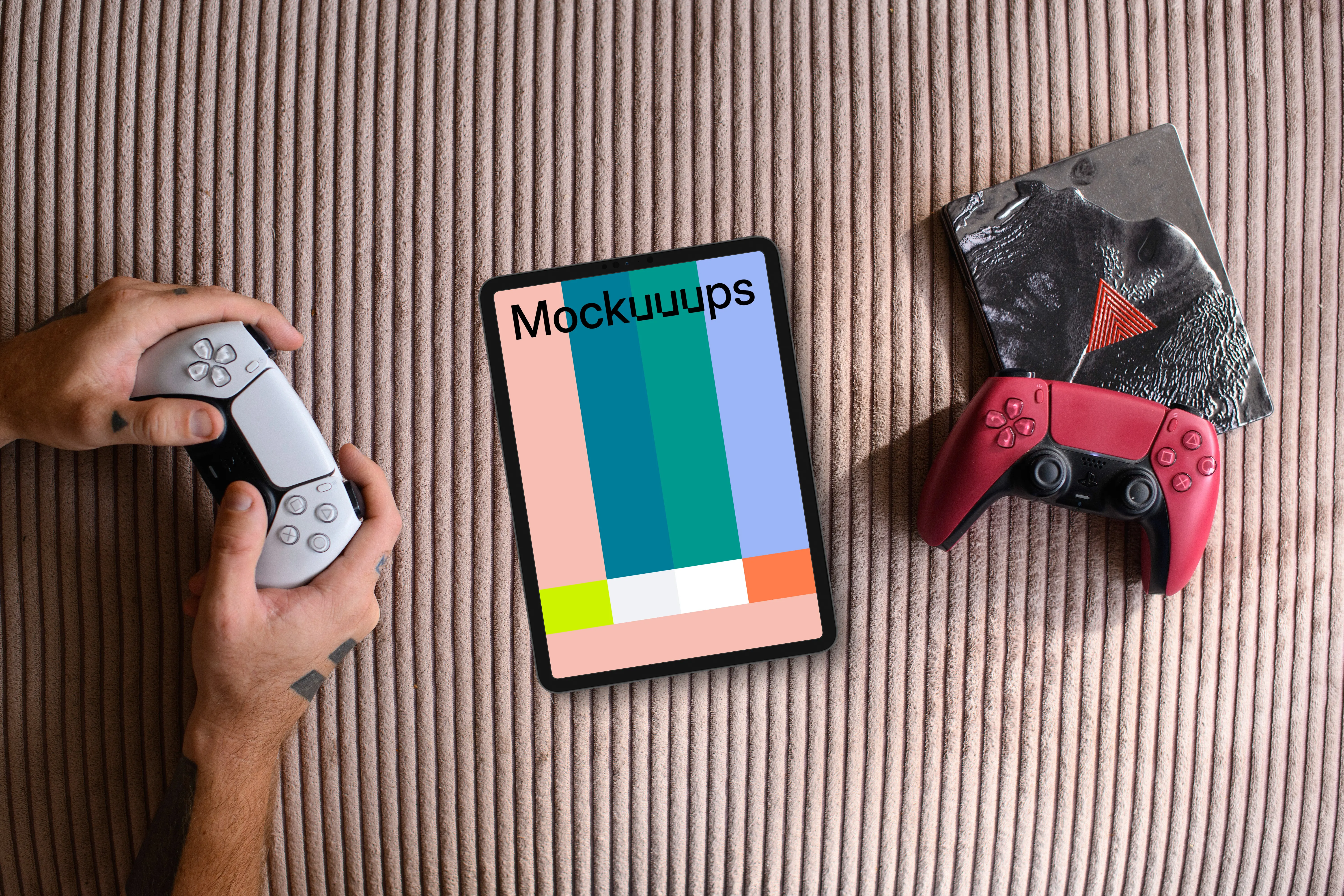 Tablet mockup with gaming controllers on textured background