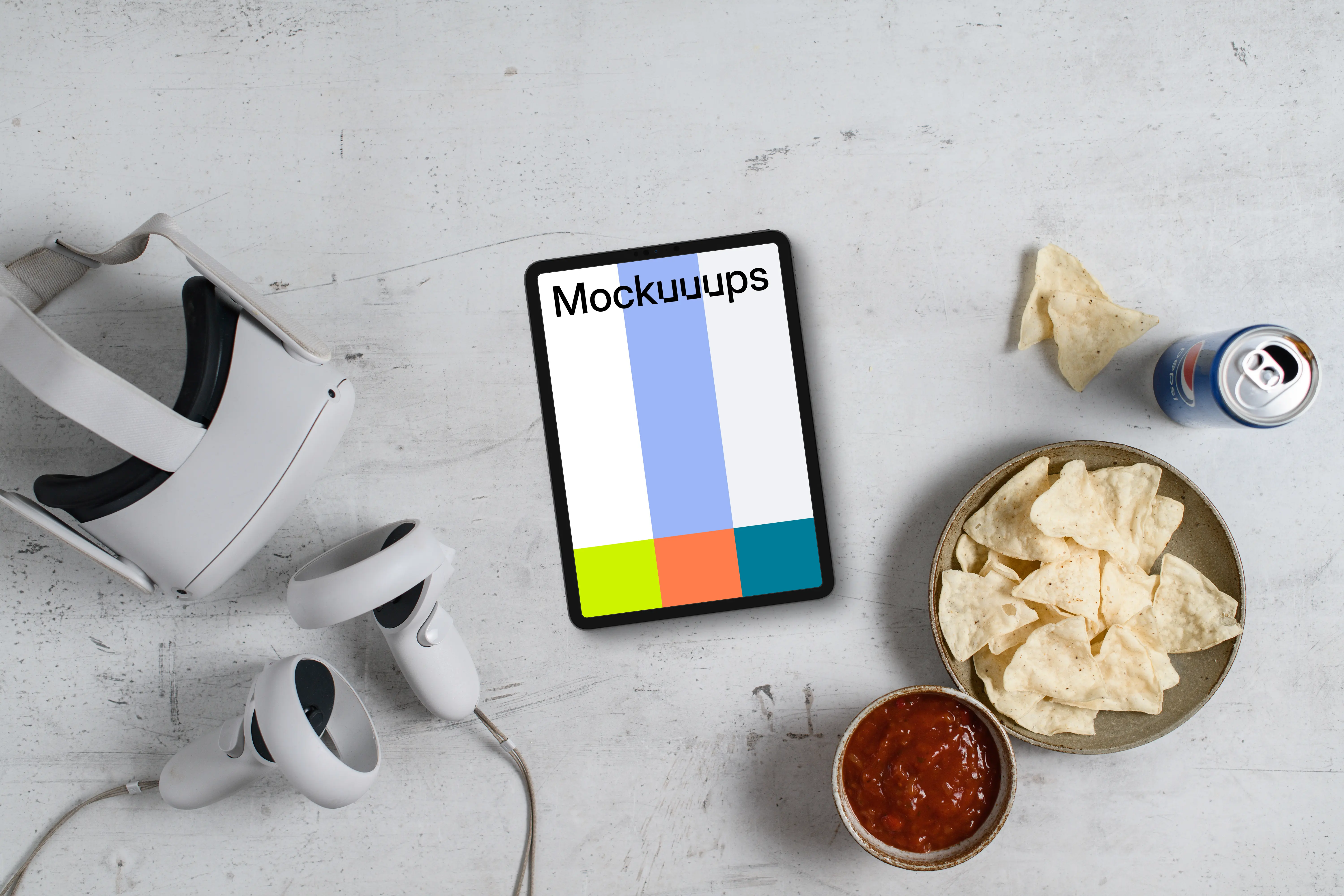 Tablet mockup with VR gaming setup and snacks