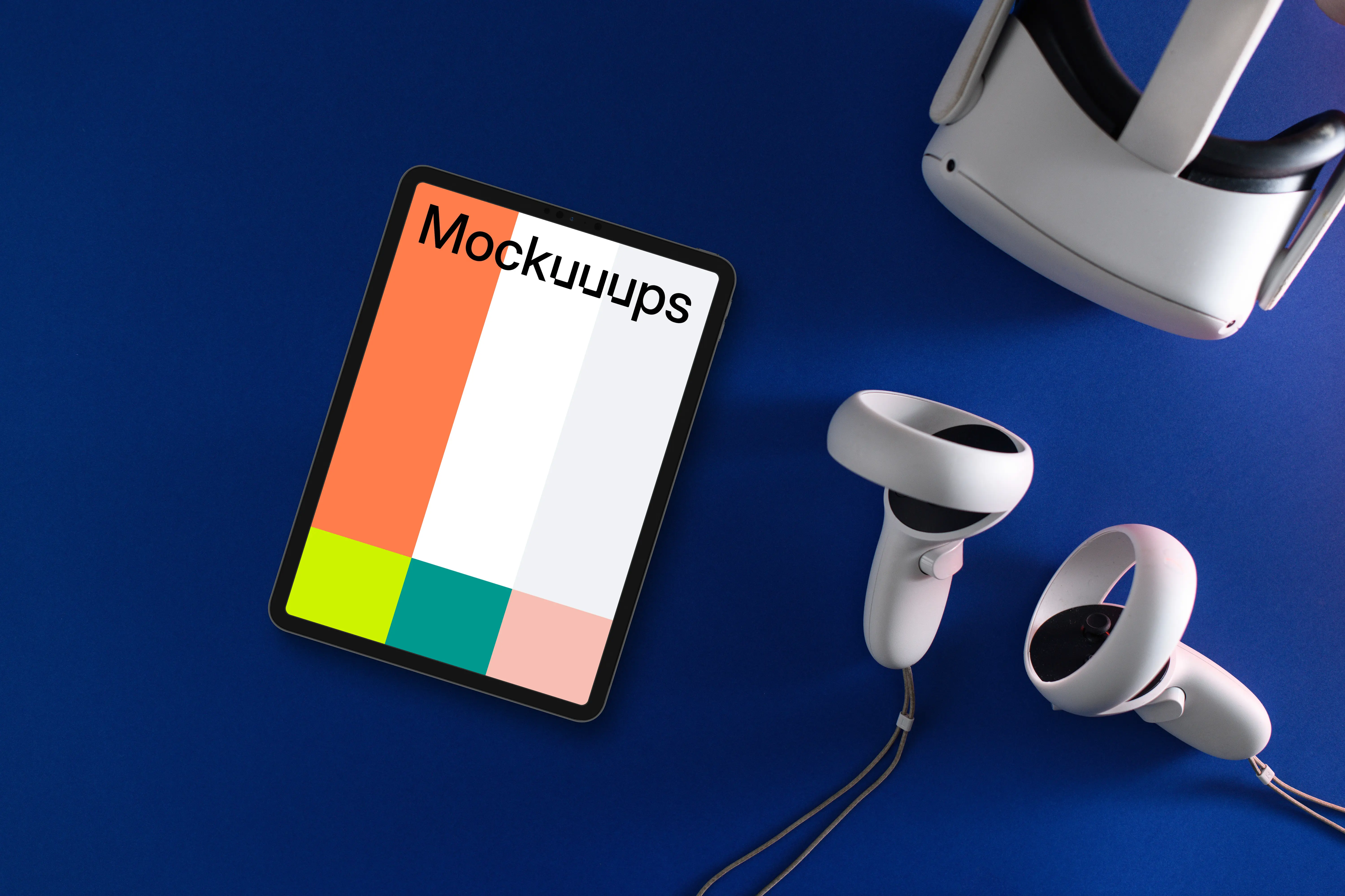 Tablet mockup with VR headset and headphones on blue background