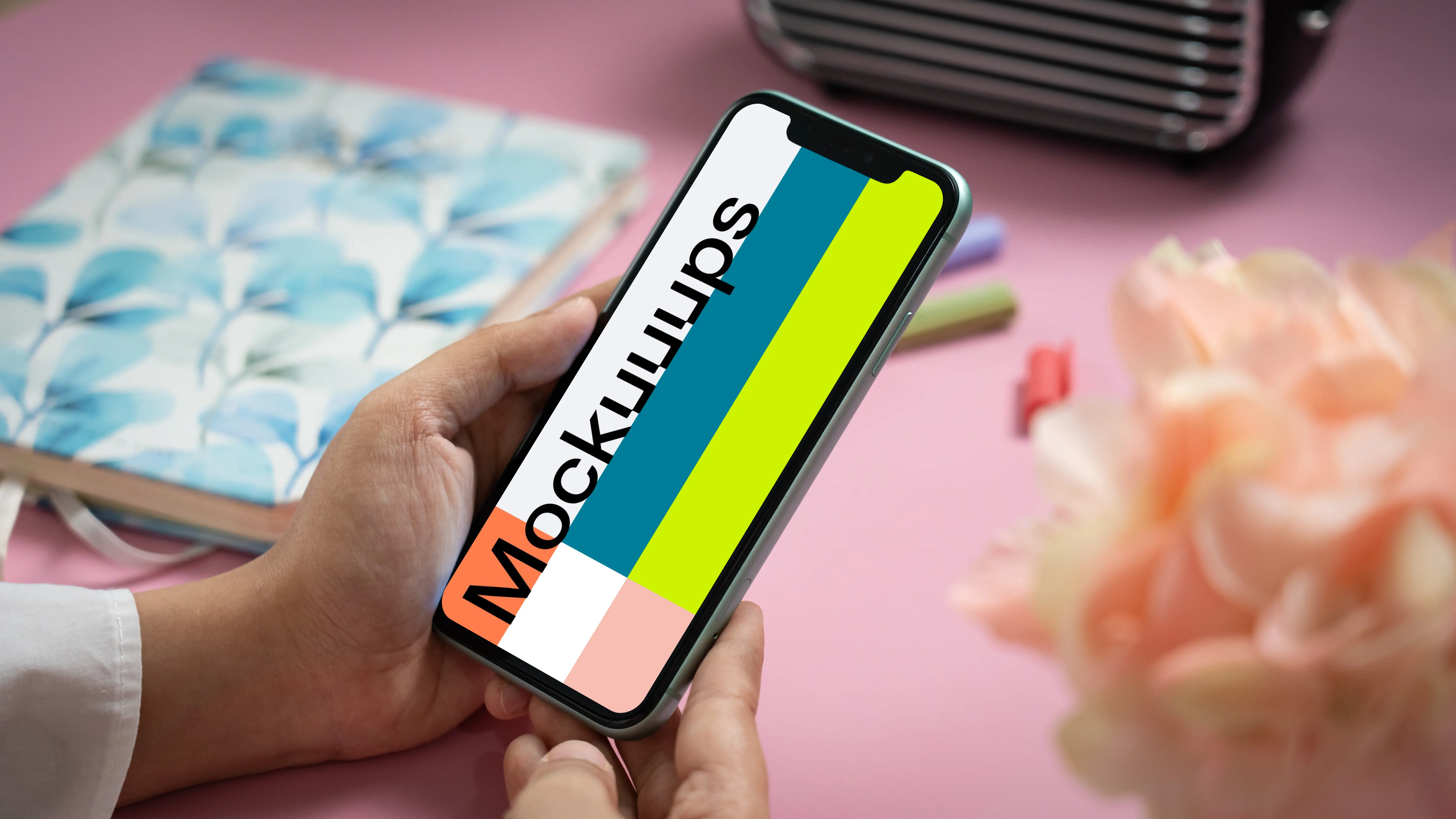 User holding an iPhone 11 mockup