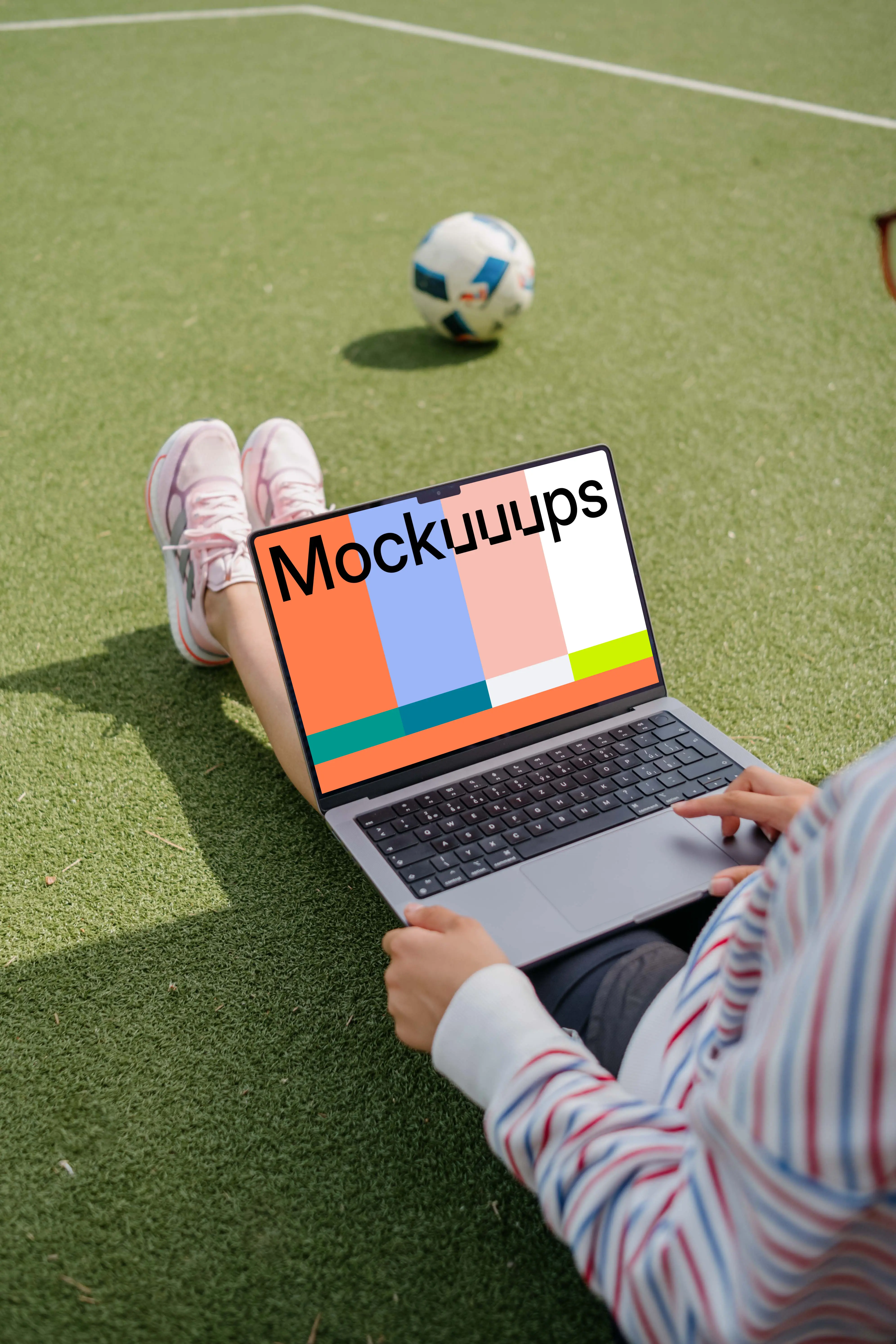 Woman hand scrolling on a MacBook Pro 14 mockup