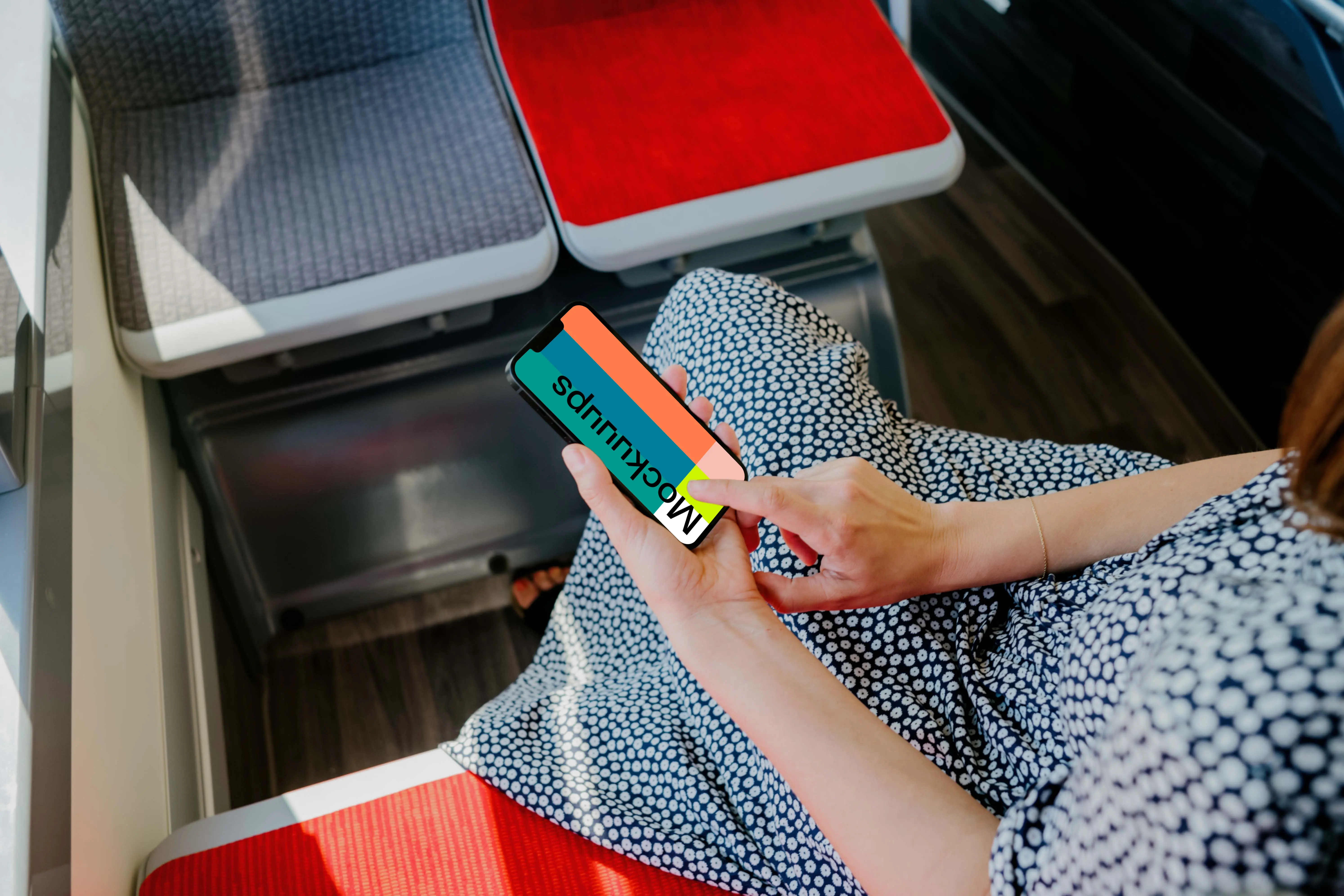 Woman hand typing on an iPhone 13 mockup