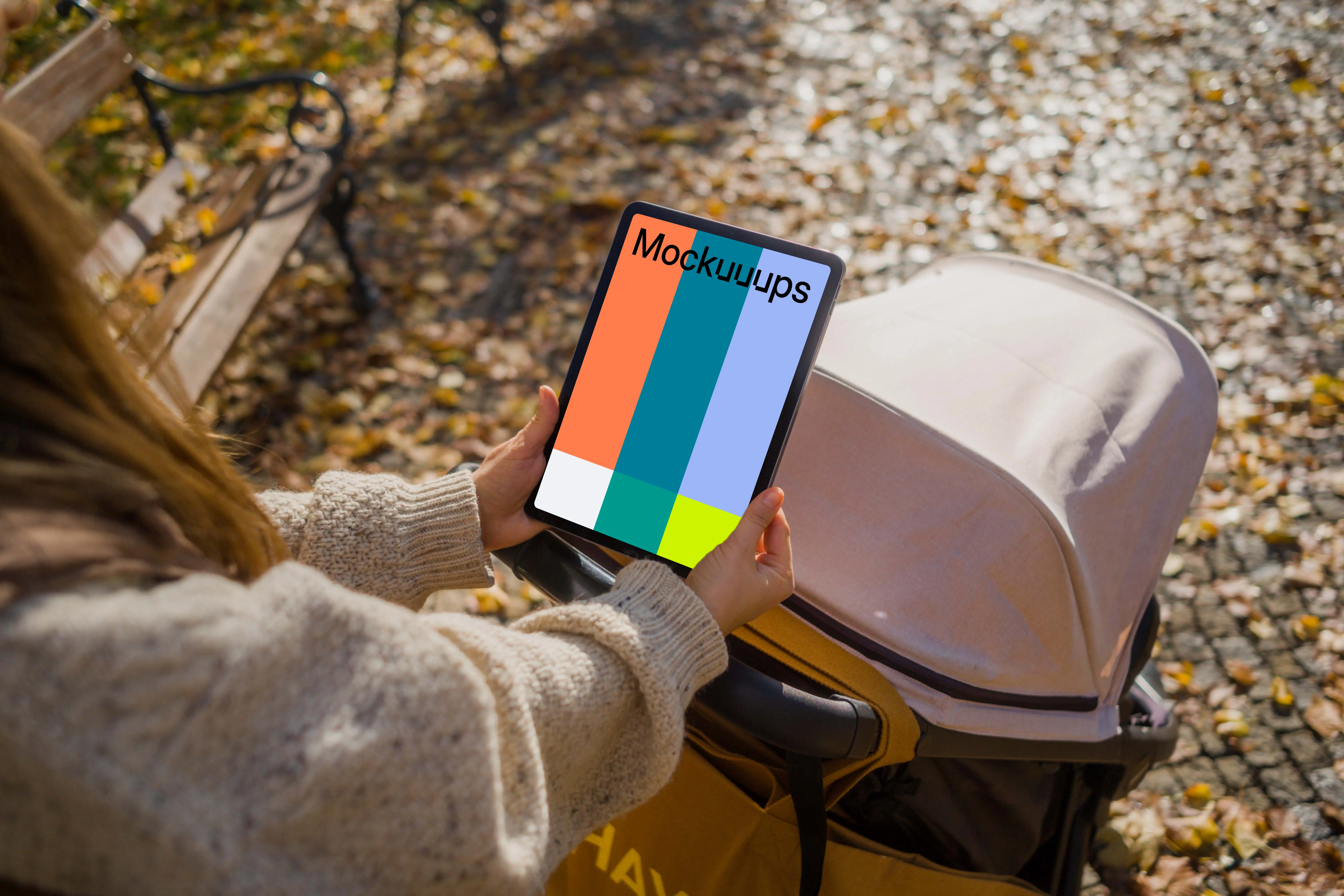 Woman hands holding an iPad Air in autumn season mockup