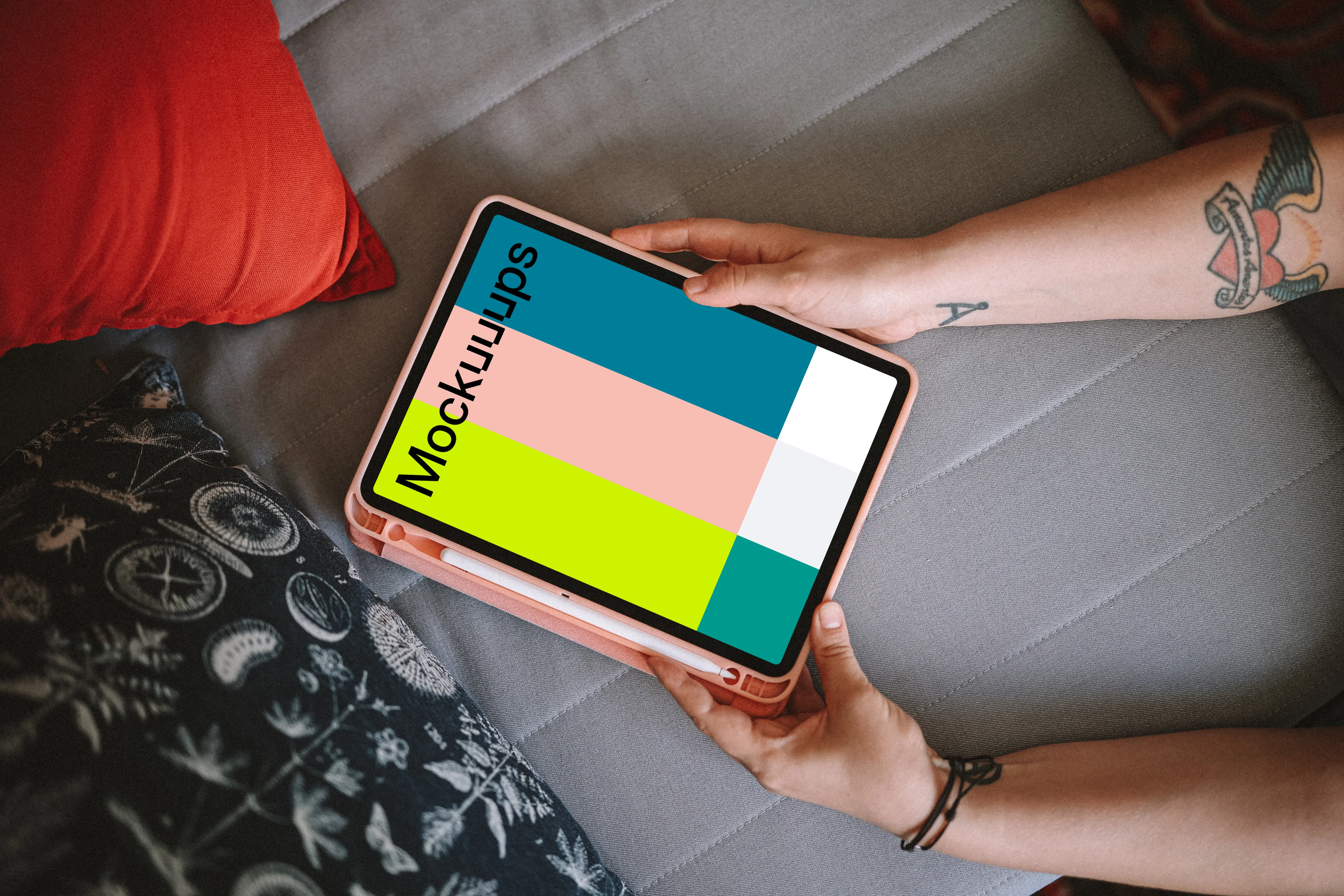 Woman holding an iPad Air mockup