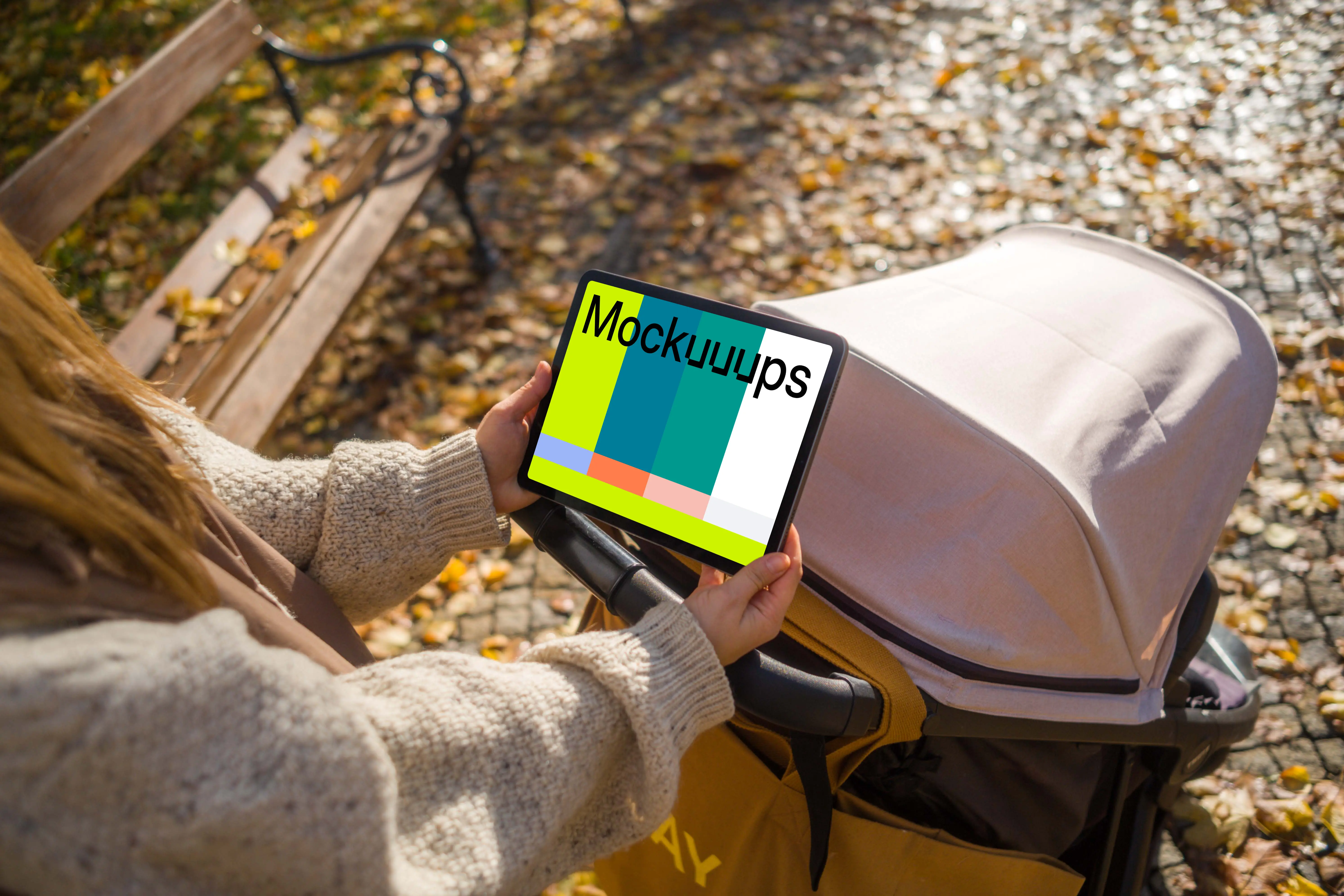 Woman with a baby stroller and tablet mockup