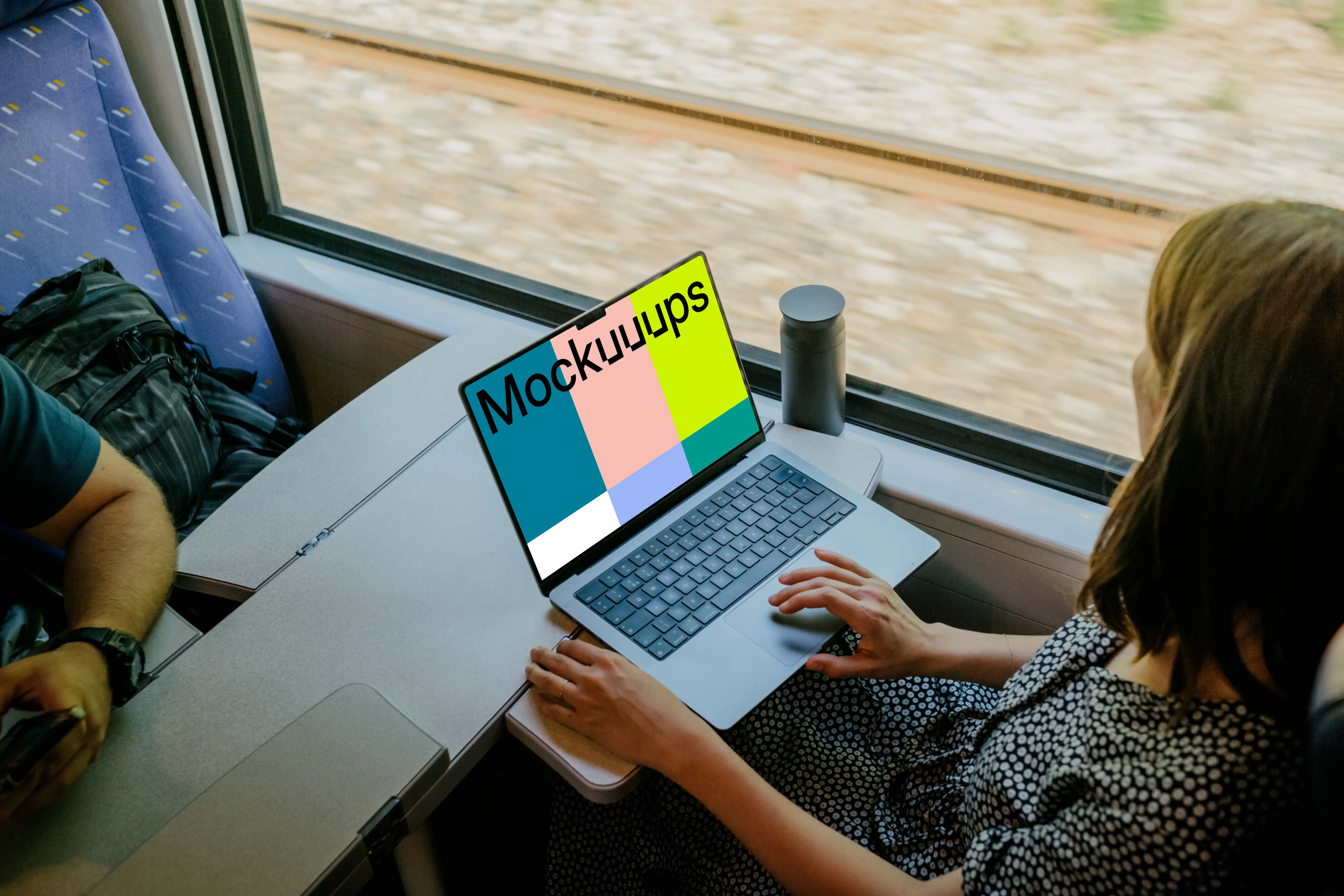 Woman working on a MacBook Pro mockup