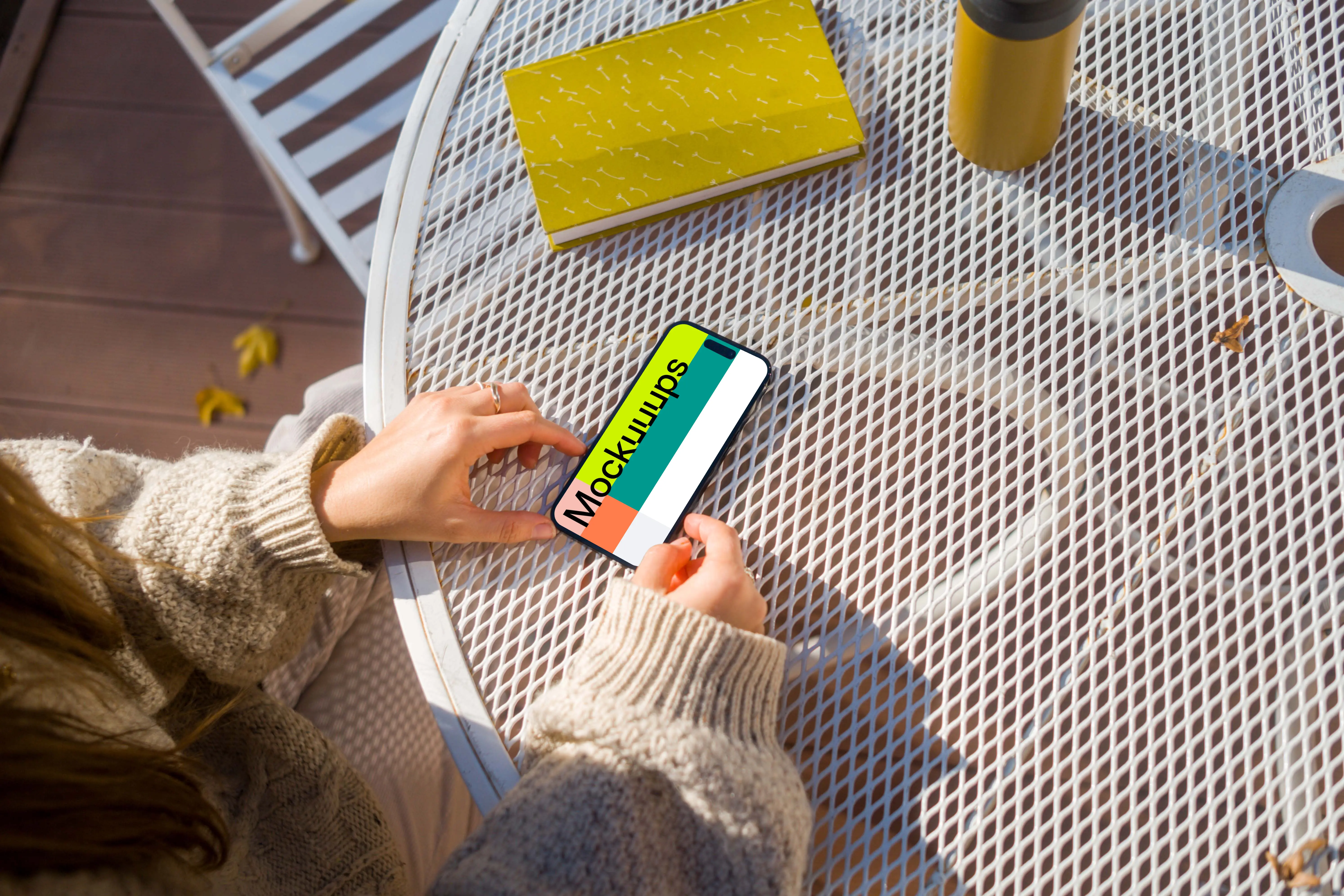 Woman working on an iPhone mockup