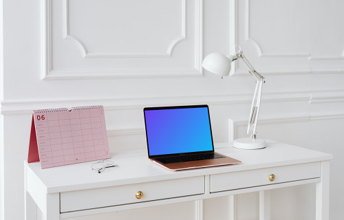 MacBook Air mockup with a pink calendar at the side