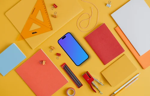 Phone mockup with back to school elements around