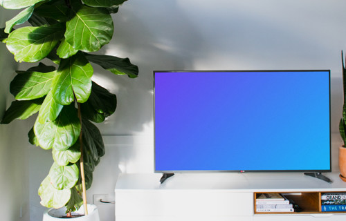 Smart television mockup on a white TV stand