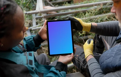 Construction workers with an iPad mockup