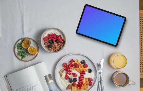 Delicious breakfast waffles next to the tablet mockup