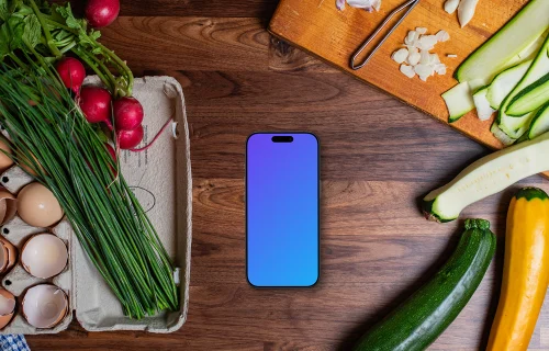 Delicious ingredients in the kitchen with phone mockup