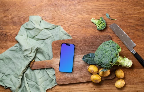 Verduras frescas con iPhone mockup