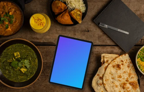 Indian food around tablet mockup