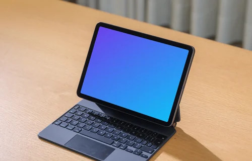 iPad Air mockup on wooden desk with keyboard