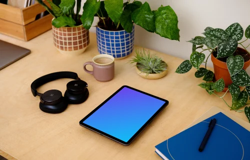 iPad Air mockup with a coffee mug at the side