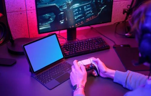 iPad Air mockup with gaming controller in neon-lit room