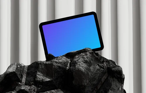 iPad Mini mockup on a rock