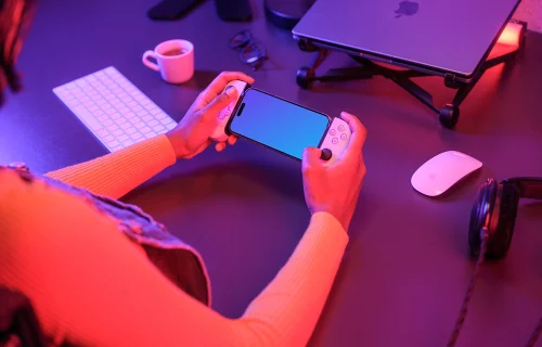 iPhone 15 Pro mockup for gaming in a vibrant setting
