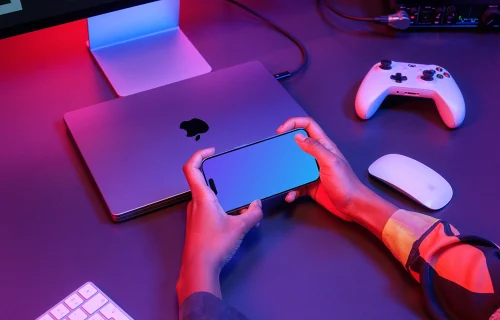 iPhone 15 Pro Mockup in a Gaming Setup