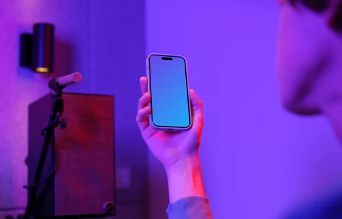 iPhone 15 Pro mockup in a gaming studio