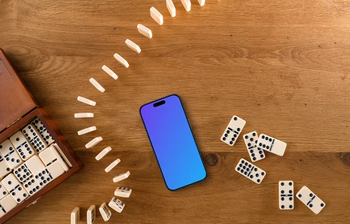 iPhone mockup in the middle of dominoes