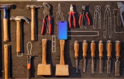 iPhone mockup on a wall with tools