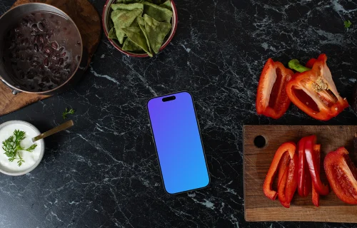 iPhone mockup on the marble kitchen unit