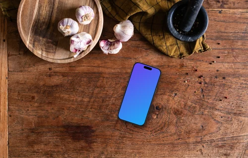 iPhone mockup en el aparador de madera de la cocina