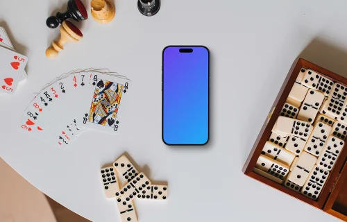 iPhone mockup entouré de jeux de société