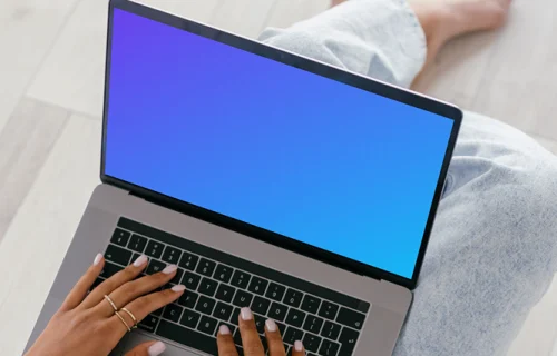 MacBook Air mockup on a user's lap