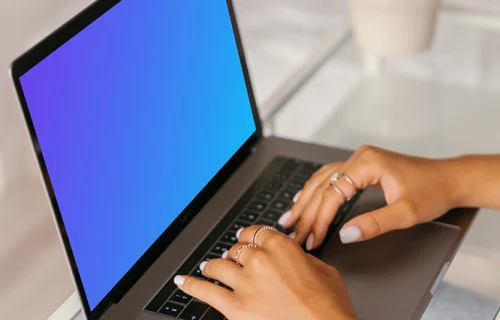 MacBook Air mockup showing a user typing