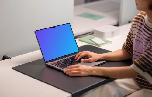 MacBook Pro 14 mockup with female professional in office setting