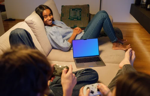 MacBook Pro mockup in cozy gaming setup