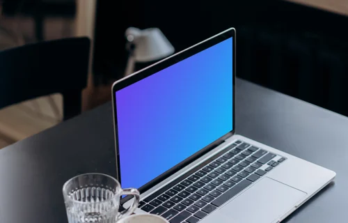 MacBook Pro mockup on a black table