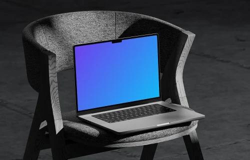 MacBook Pro mockup on a textured chair with dramatic shadows