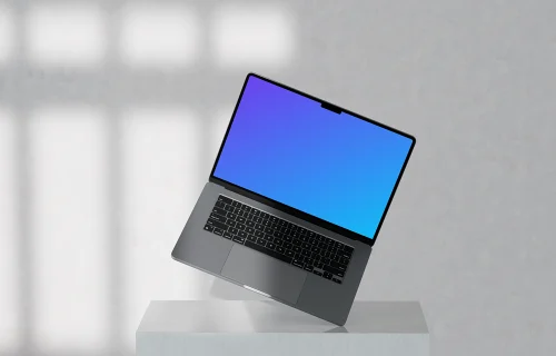 MacBook Pro mockup on marble pedestal