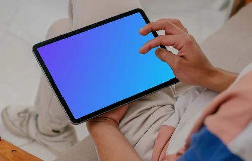 Male hands working on iPad Air mockup