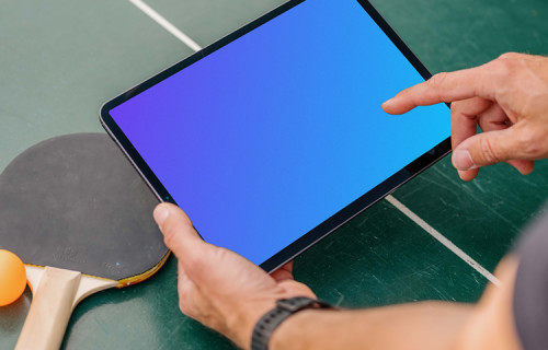 Man pointing on an iPad mockup