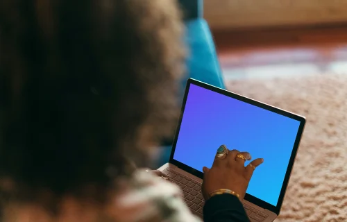 Microsoft Surface Laptop mockup on a user’s lap