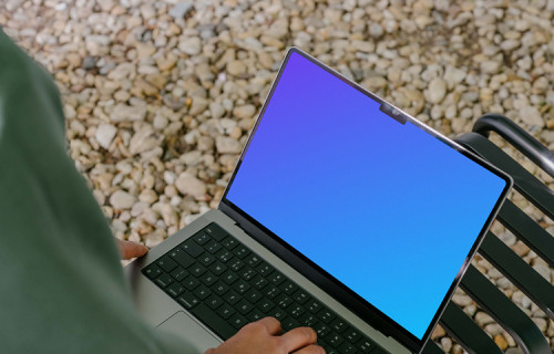 Person working on MacBook Pro mockup