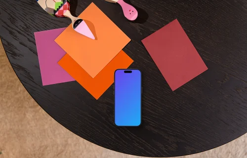 Smartphone mockup on a designer office table