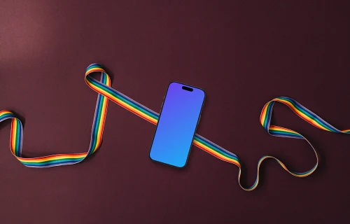 Smartphone placed on a twisted pride ribbon