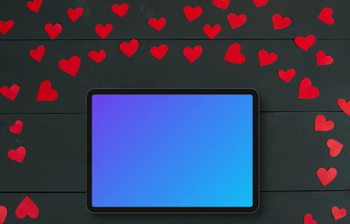 Tablet mockup with hearts surrounding it