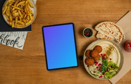 Tablet mockup with hummus and falafel